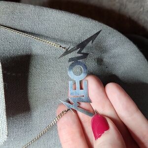 Meow necklace in Metallica style